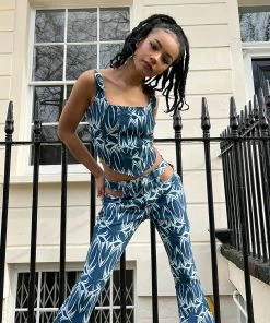 New Girl Order TATTOO DENIM CUT OUT FLARES